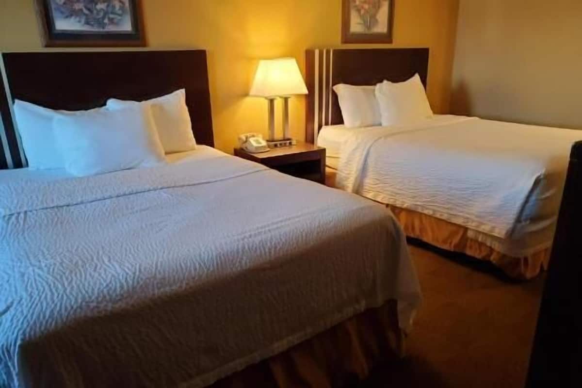 Desk, laptop workspace, blackout drapes, iron/ironing board