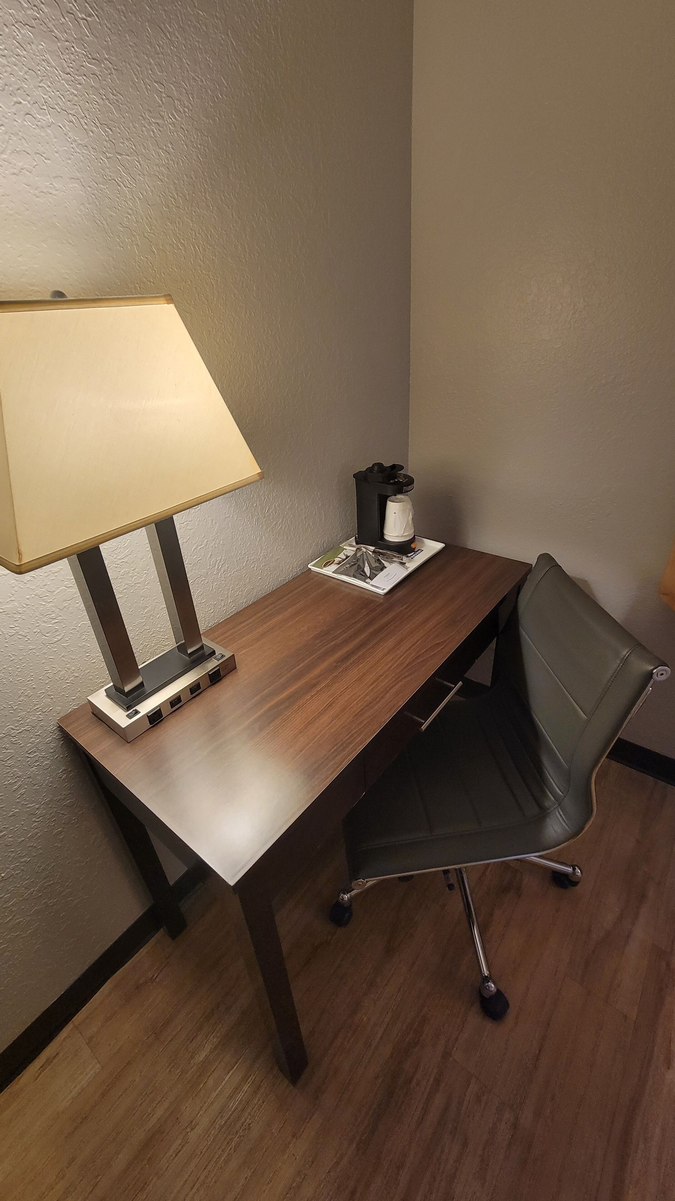 desk, laptop workspace, blackout curtains, iron/ironing board