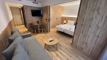 Premium-huoneisto, 1 makuuhuone, keittiö, kaupunkinäköala | Egyptinpuuvillaiset lakanat, untuvapeitot, pillowtop-patjalliset sängyt