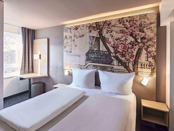 Desk, blackout drapes, soundproofing, free WiFi