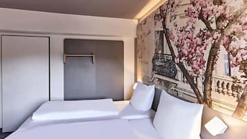 Desk, blackout drapes, soundproofing, free WiFi