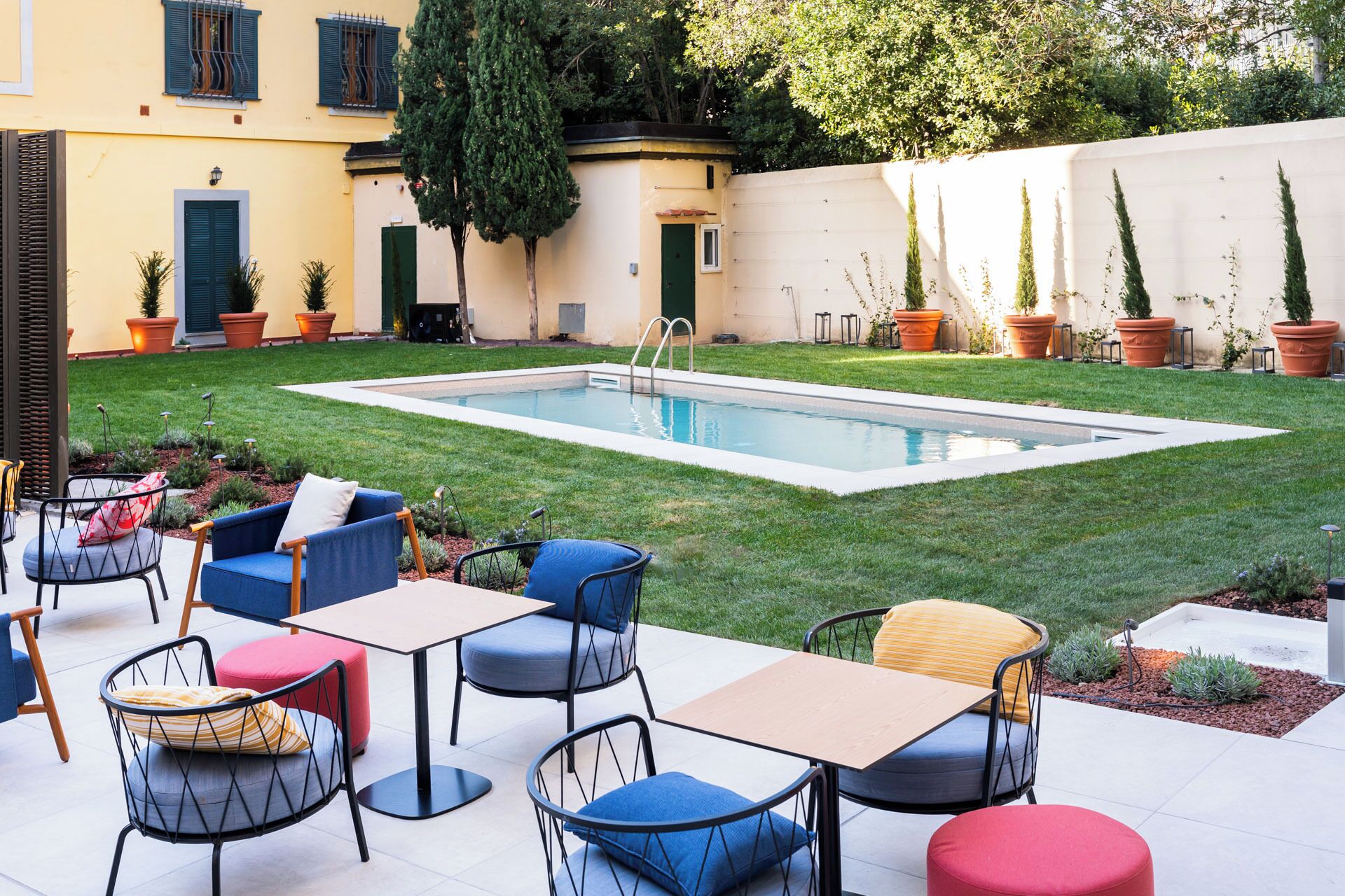 Seasonal outdoor pool, open 10:00 AM to 6:00 PM, sun loungers