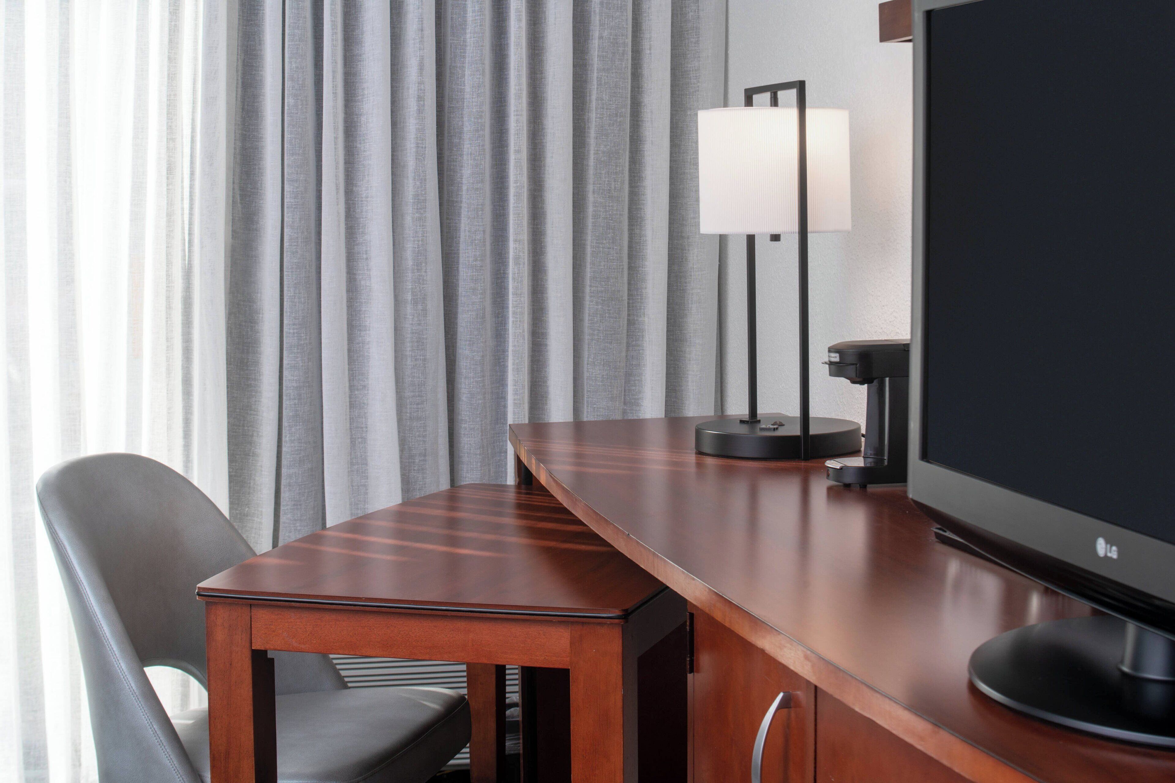 premium bedding, down duvets, desk, blackout curtains