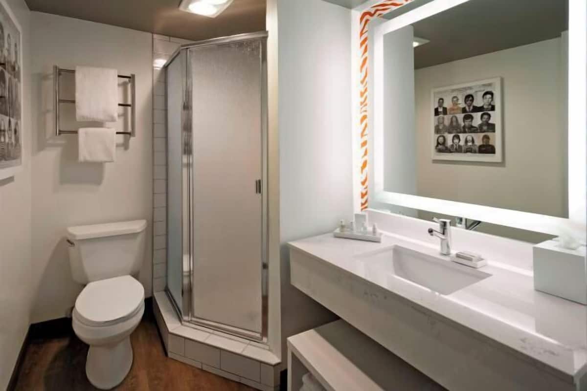 Bathroom | Designer toiletries, hair dryer, towels