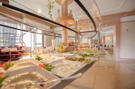 Daily buffet breakfast (AED 125 per person)