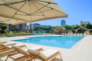 Outdoor pool, sun loungers