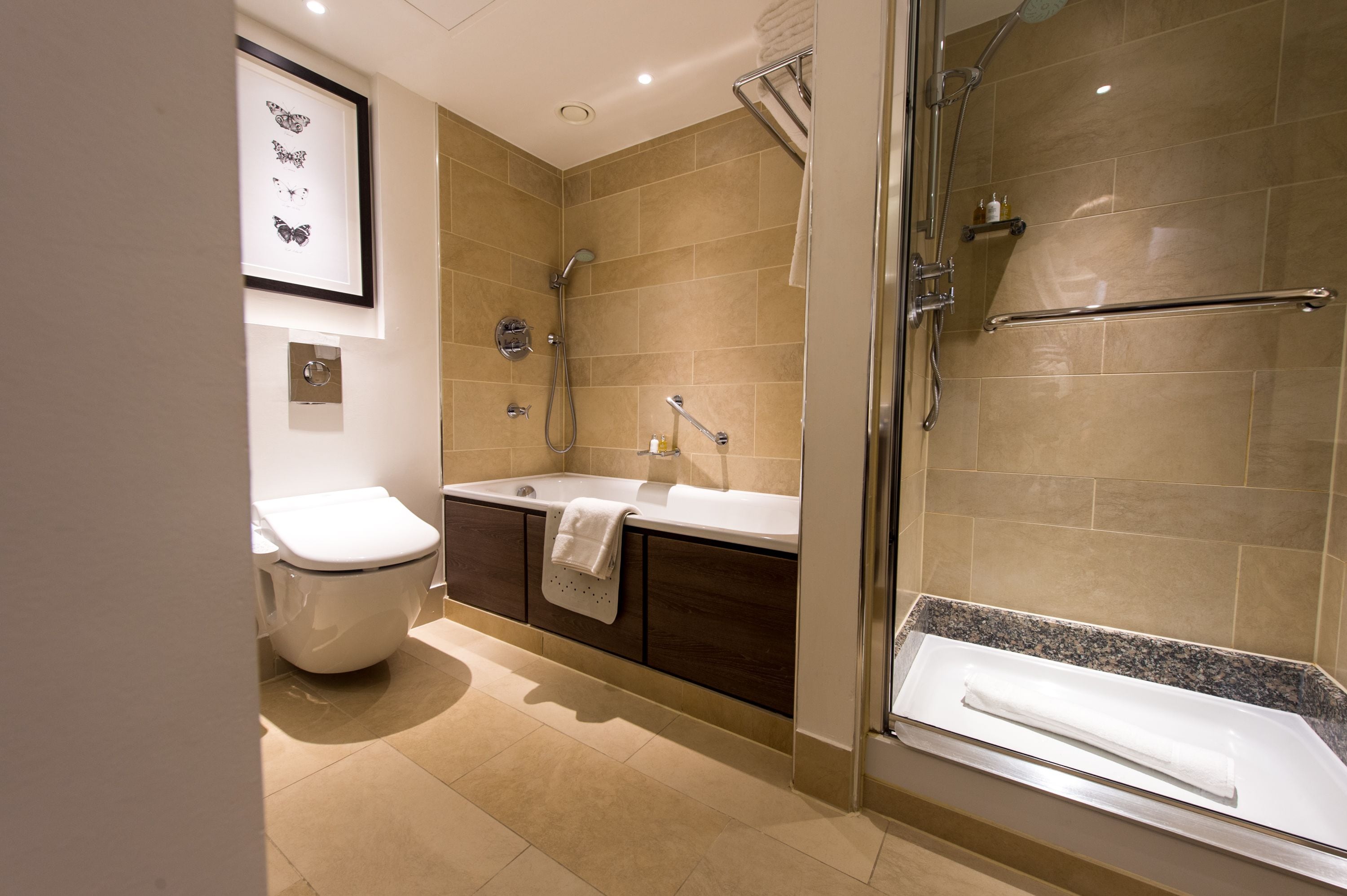 regency, executive suite, 1 king bed | bathroom | eco-friendly toiletries, hair dryer, bathrobes, slippers