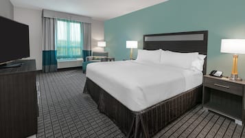 Suite, 1 King Bed with Sofa bed | In-room safe, desk, blackout drapes, iron/ironing board