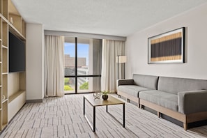 Executive-Suite, 1 Schlafzimmer | Wohnzimmer | 55-Zoll-Fernseher mit Kabelempfang