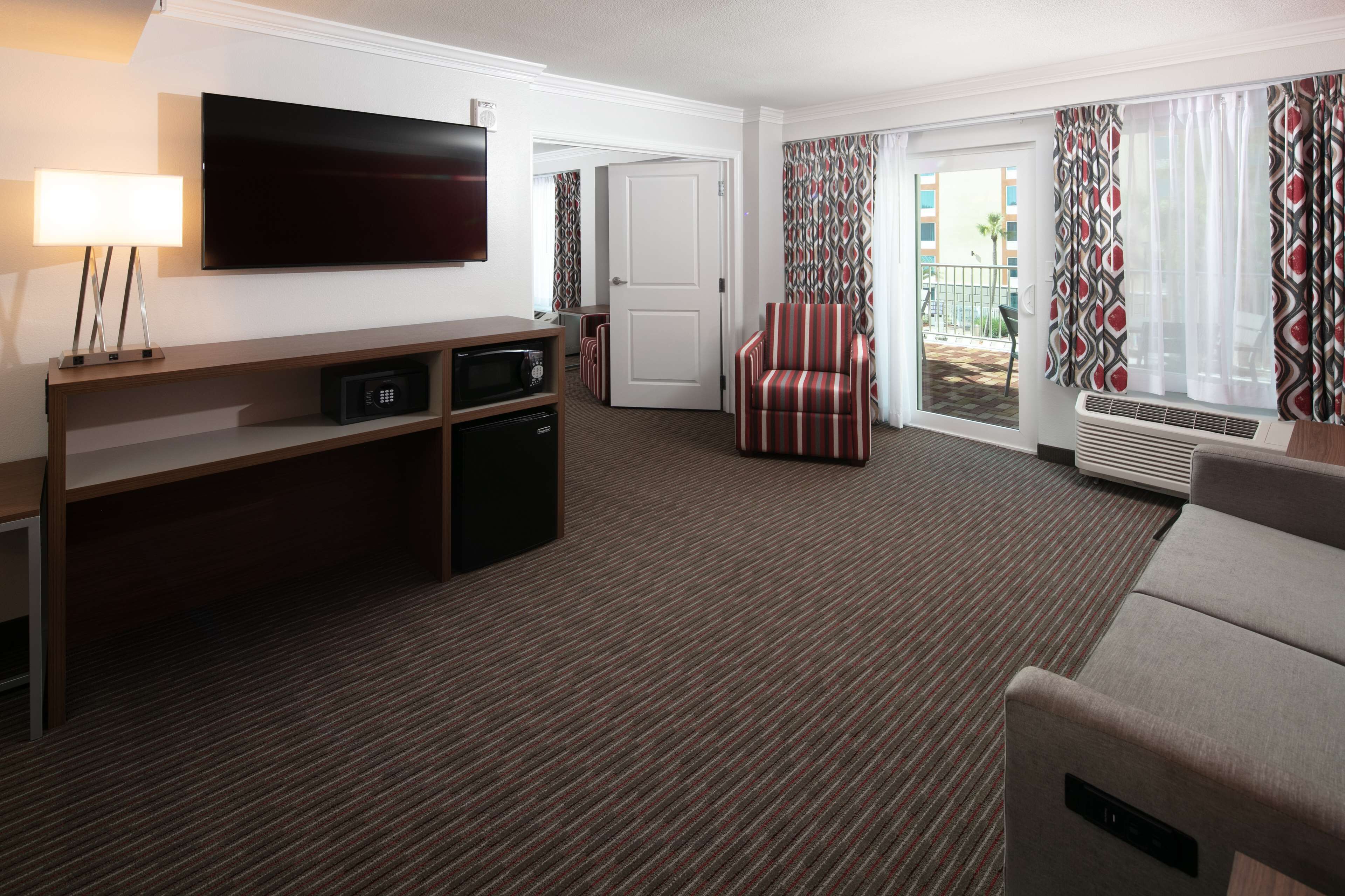 junior studio suite, 1 king bed with sofa bed | 1 bedroom, in-room safe, blackout curtains, iron/ironing board