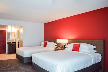 Room, 2 Queen Beds, Accessible, Non Smoking | In-room safe, blackout drapes, iron/ironing board at Radisson Hotel Orlando Lake Buena Vista South
