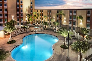 Outdoor pool, pool umbrellas, sun loungers