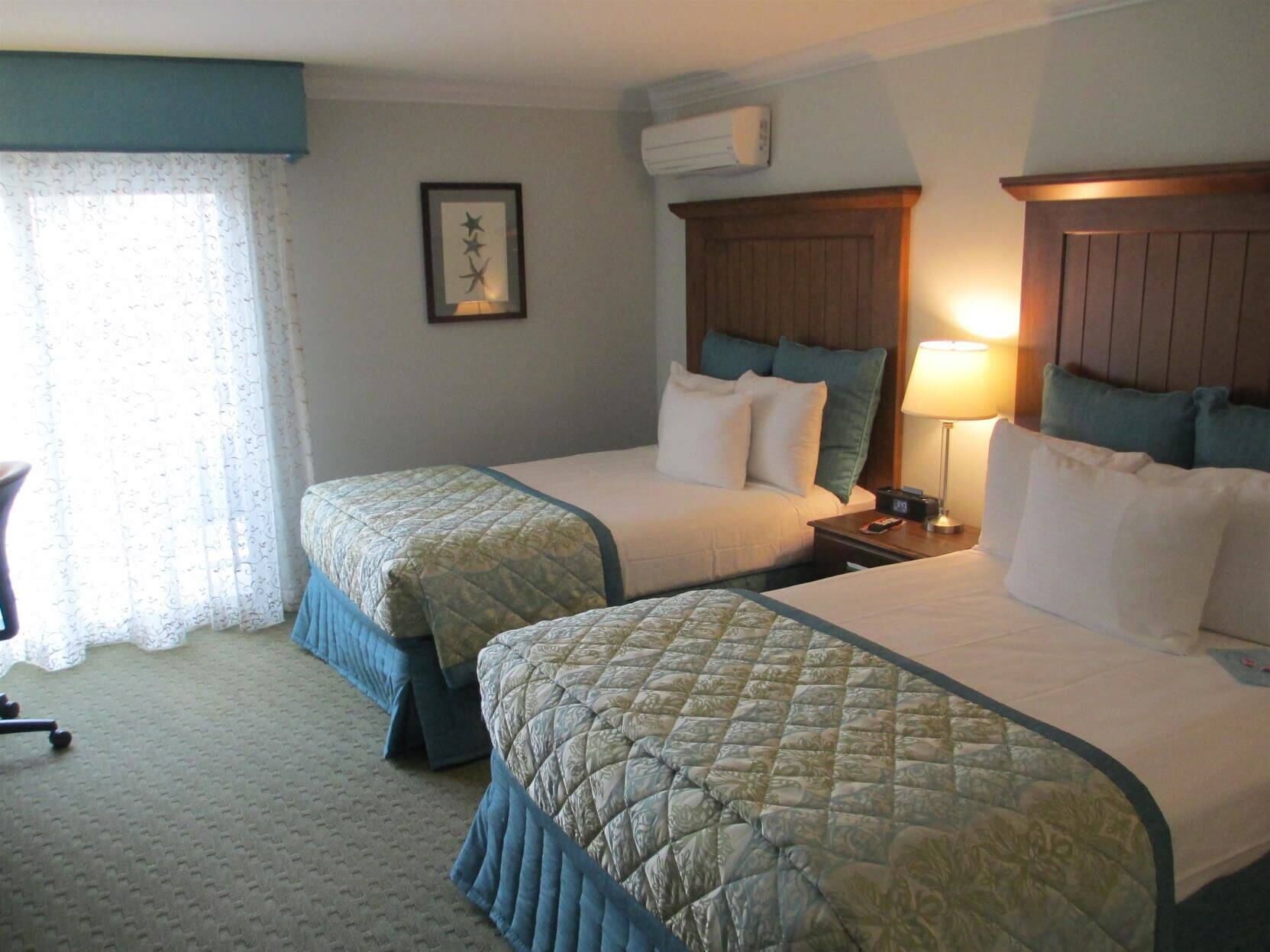 Premium bedding, pillow-top beds, in-room safe, blackout curtains