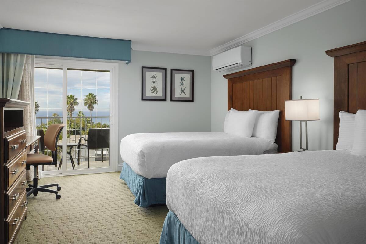 Premium bedding, pillowtop beds, in-room safe, blackout drapes