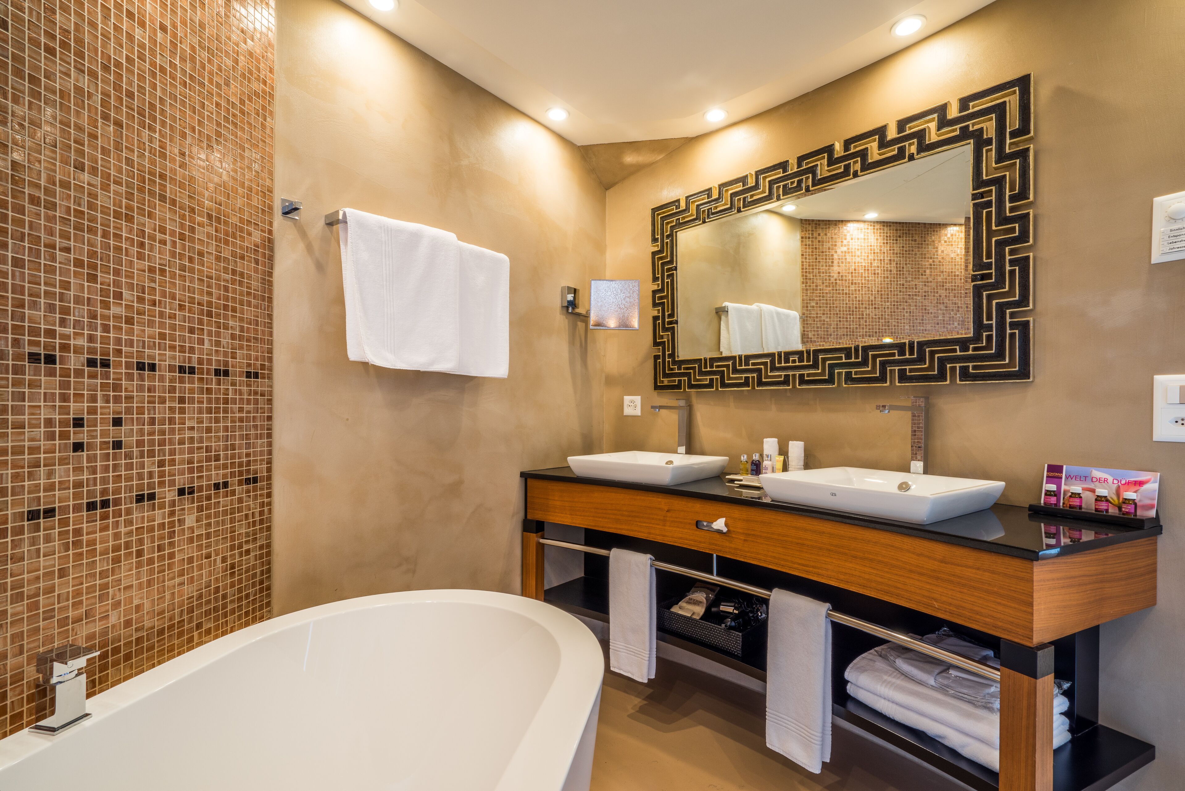 penthouse spa suite lakeside | bathroom | free toiletries, hair dryer, slippers, towels