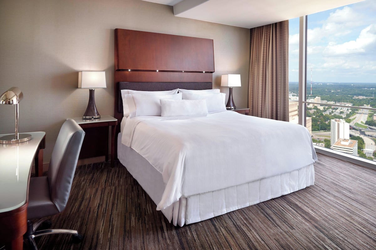 Premium bedding, down comforters, pillowtop beds, in-room safe