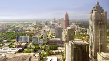 A cityscape with high-rise buildings, including a prominent building labeled "Coastal States."