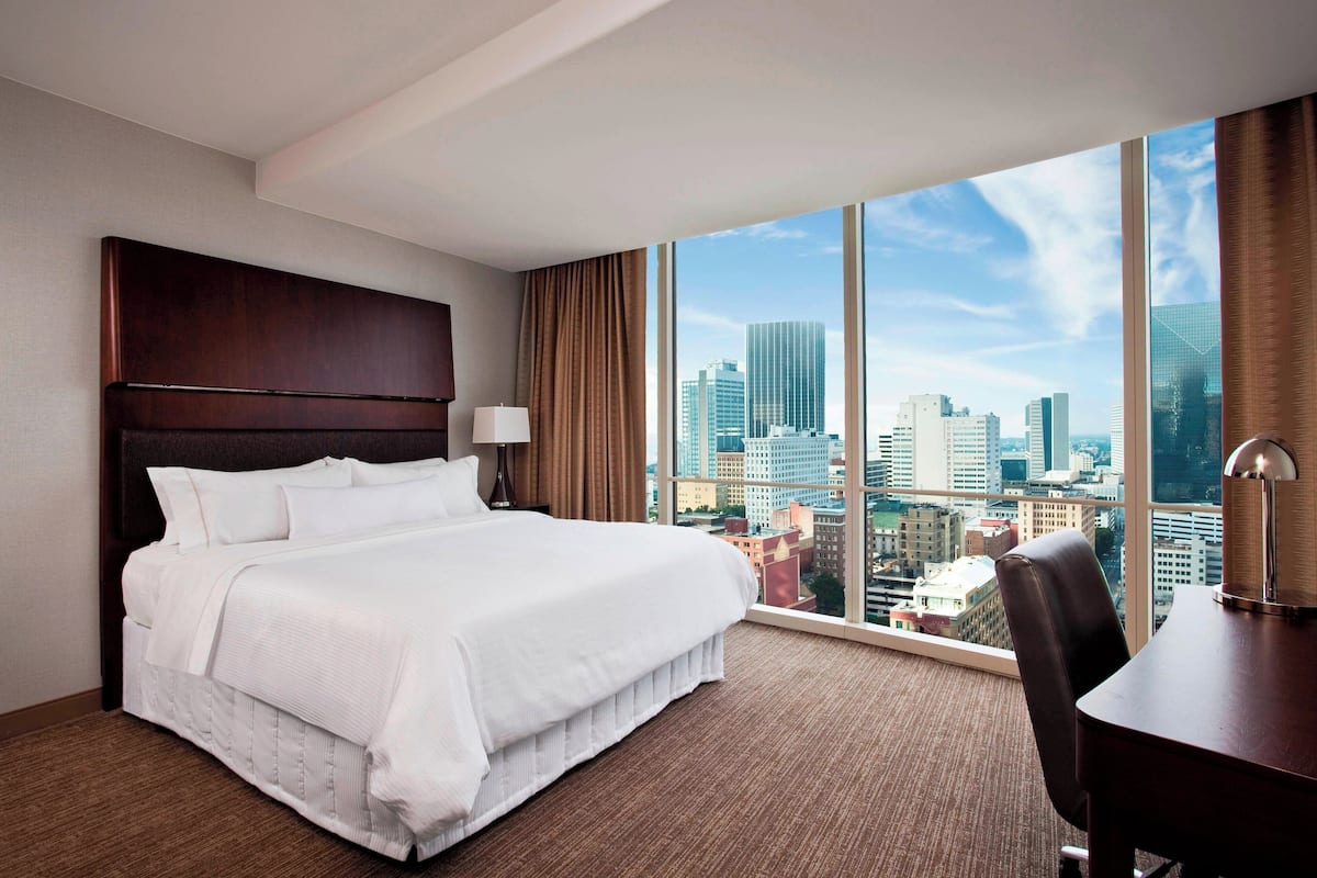 Premium bedding, down comforters, pillowtop beds, in-room safe