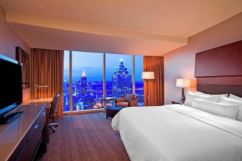 Premium bedding, down comforters, pillowtop beds, in-room safe
