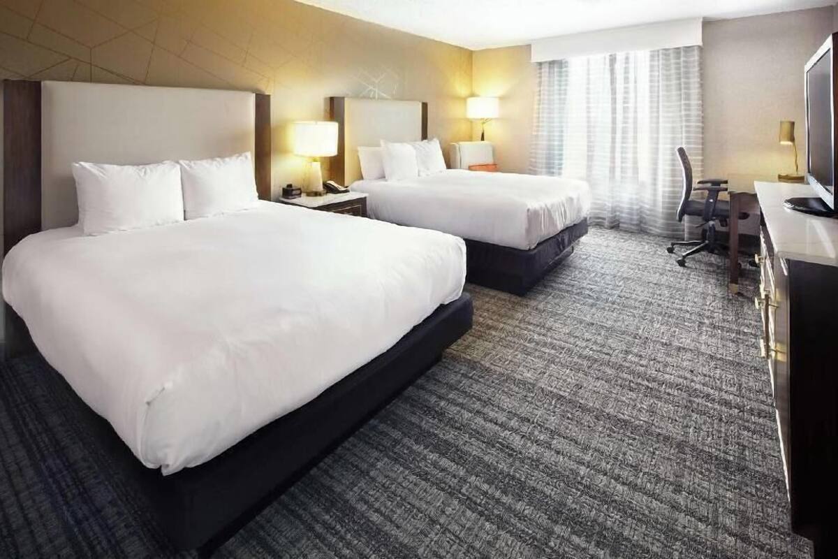 Premium bedding, down comforters, pillowtop beds, in-room safe