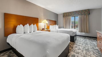 Suite, 2 Queen Beds, Non Smoking, Refrigerator (Oversized Room;Third bed is a Sofabed) | 1 bedroom, blackout drapes, iron/ironing board, Internet