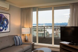 Suite, 2 Bedrooms | Living area | 40-inch TV with cable channels