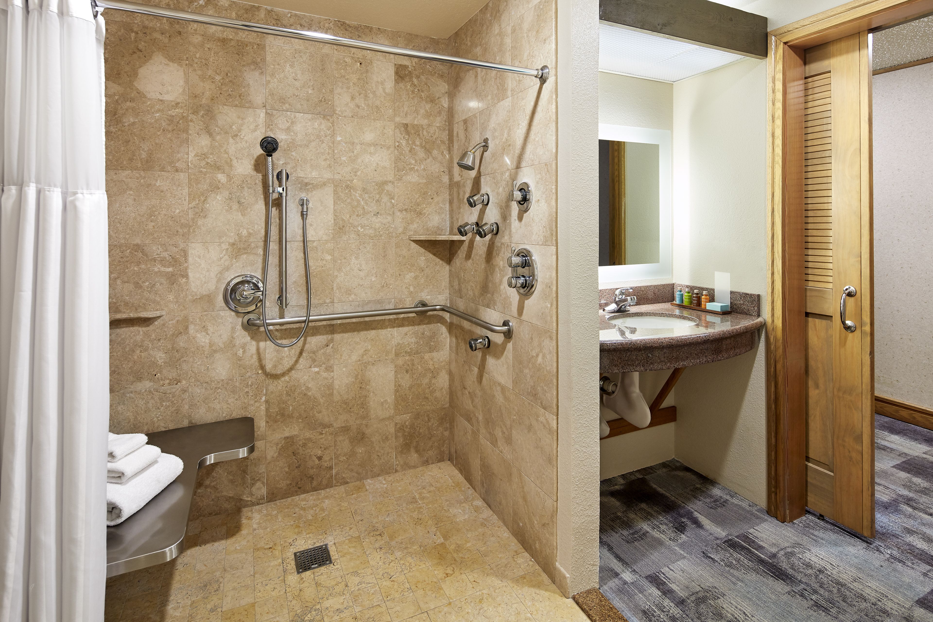 deluxe room, 1 king bed, accessible (roll in shower) | in-room safe, individually decorated, individually furnished, desk