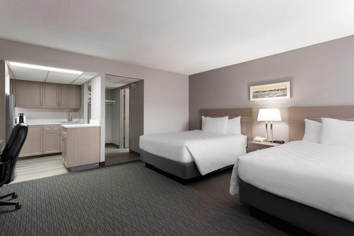 Deluxe Room, 2 Queen Beds, Non Smoking, Kitchen (Ground Floor) | Desk, blackout drapes, soundproofing, iron/ironing board