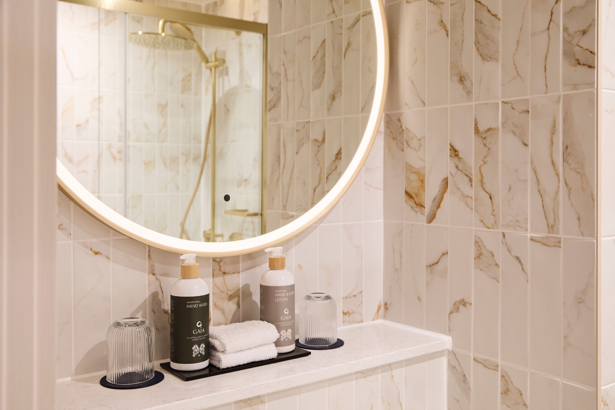 rainfall showerhead, eco-friendly toiletries, hair dryer, bathrobes