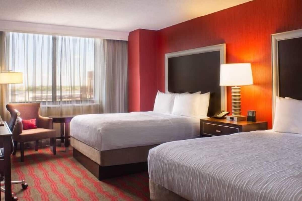 Premium bedding, in-room safe, laptop workspace, soundproofing
