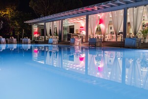 Breakfast, lunch, dinner served; international cuisine, pool views