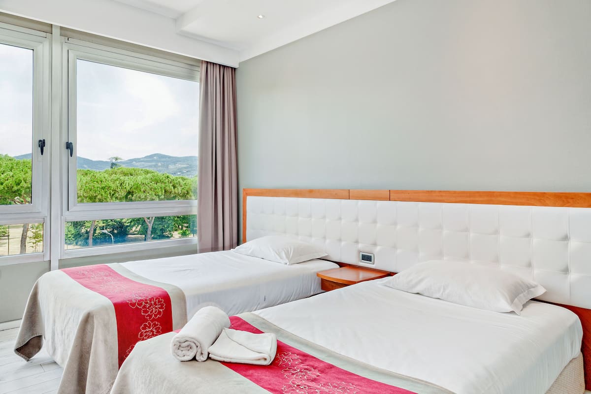 Premium bedding, down duvets, pillow-top beds, in-room safe