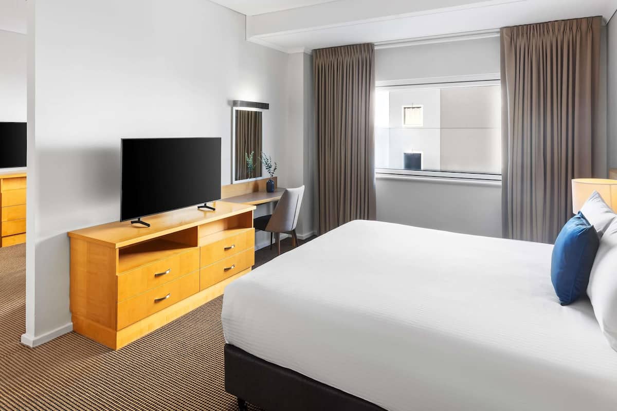 1 غرفة نوم وأغطية فراش متميزة وأسرّة بطبقة علوية مريحة وميني بار