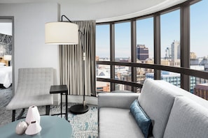 Junior Suite, 1 Bedroom (King Bed) | Living room | 42-inch flat-screen TV with cable channels, TV, pay movies