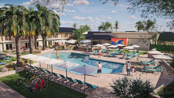 Outdoor pool, open 7:00 AM to 10:00 PM, pool loungers