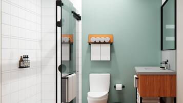 Combined shower/tub, free toiletries, hair dryer, towels