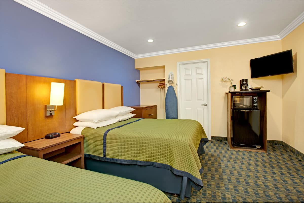 Standard Room, 2 Queen Beds | Desk, iron/ironing board, free cribs/infant beds, rollaway beds