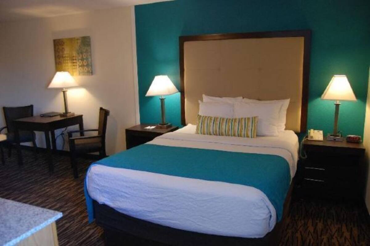 Blackout drapes, iron/ironing board, bed sheets