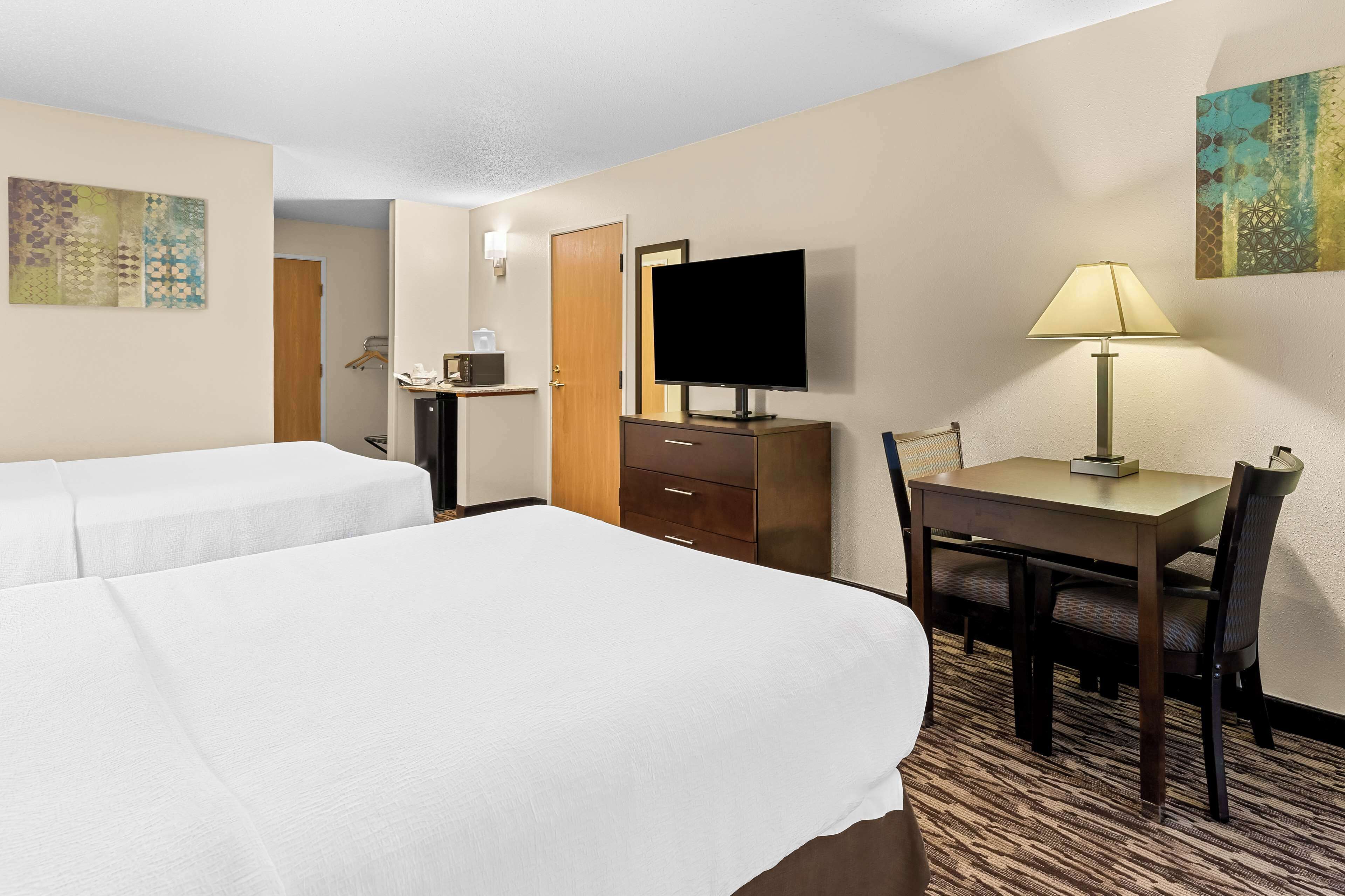 standard room, 2 queen beds, accessible, refrigerator & microwave | blackout curtains, iron/ironing board, bed sheets