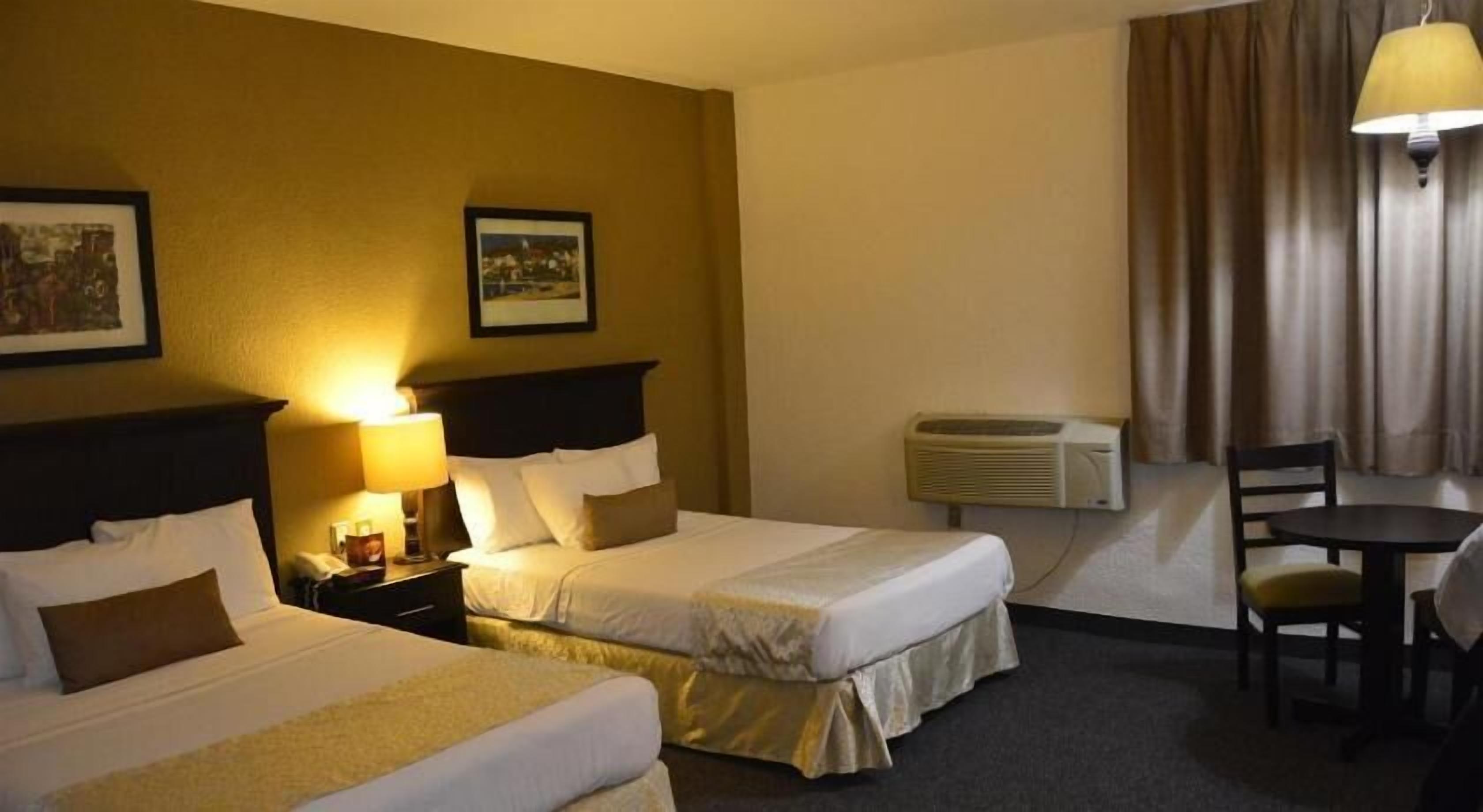 Desk, laptop workspace, blackout drapes, iron/ironing board