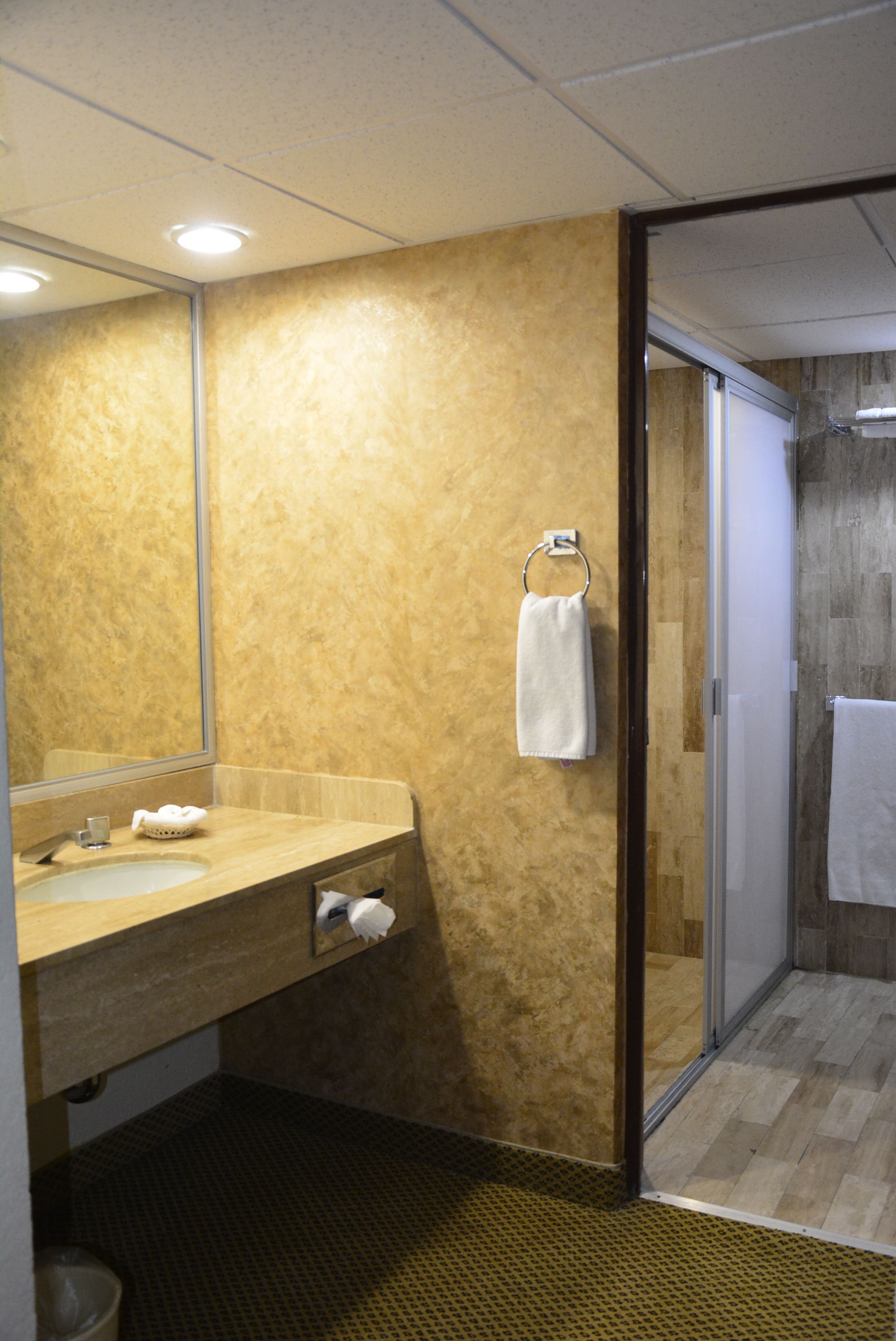 room, 2 queen beds | bathroom | shower, free toiletries, hair dryer, towels