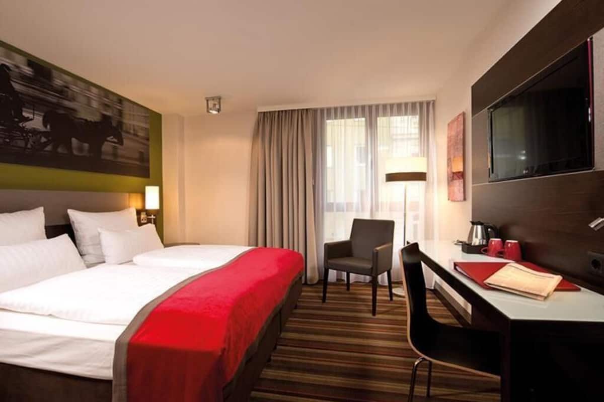 Ropa de cama de alta calidad y minibar