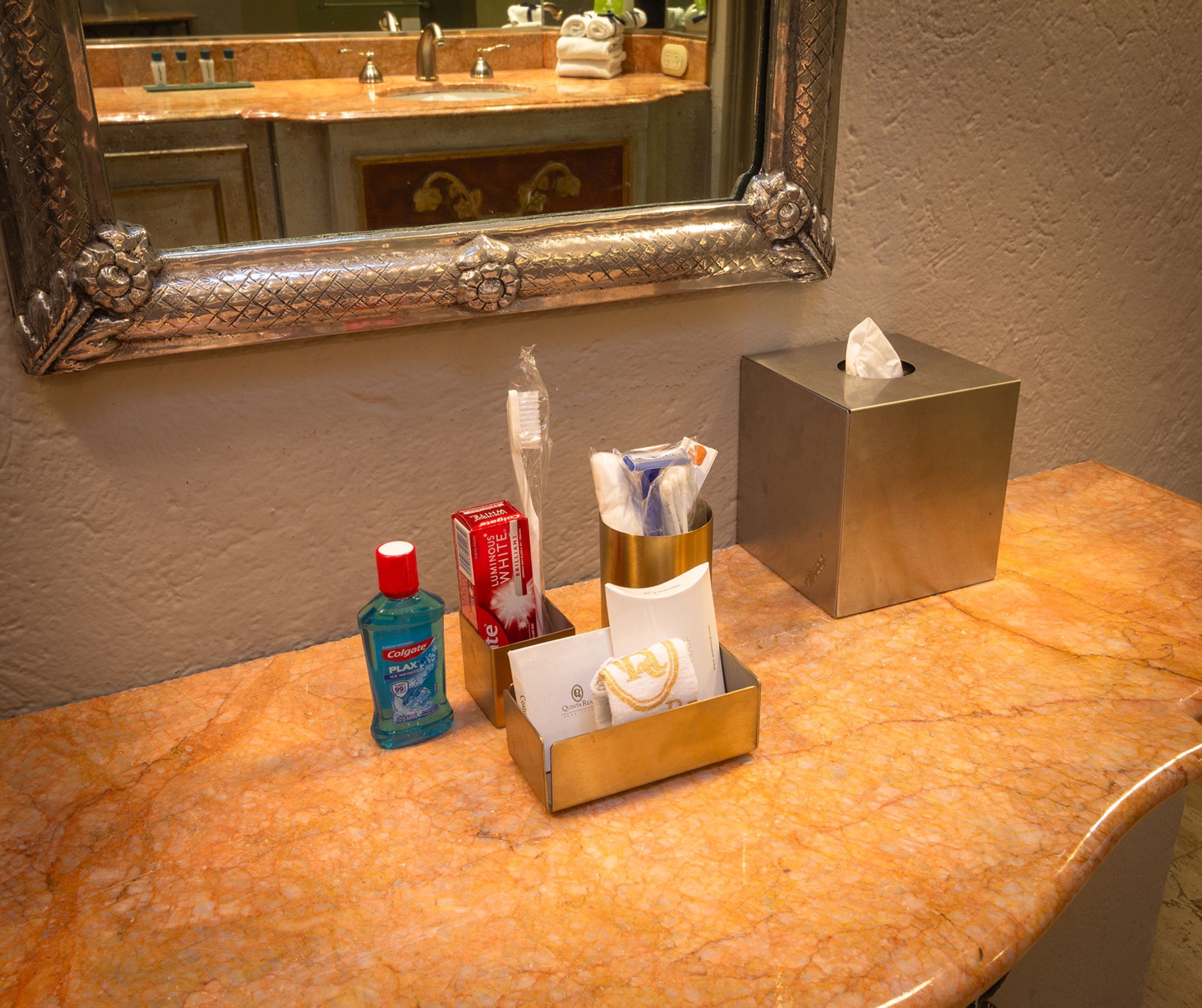 designer toiletries, hair dryer, bathrobes, slippers