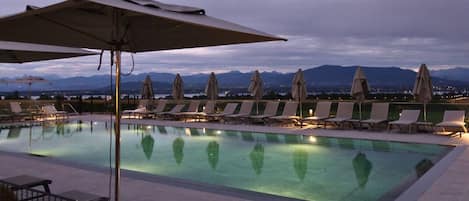 Seasonal outdoor pool, open 7:00 AM to 9:00 PM, pool umbrellas