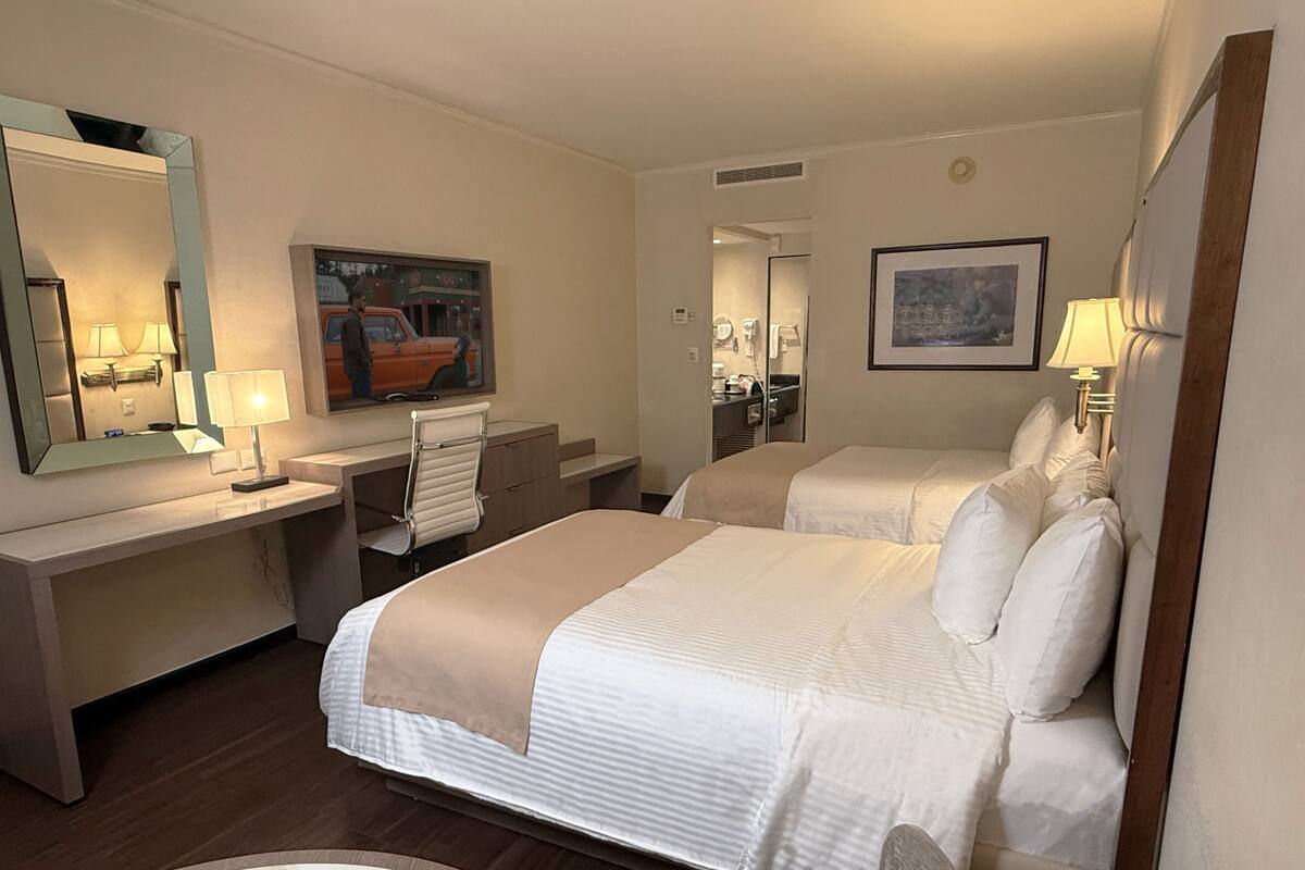 Premium bedding, down comforters, pillowtop beds, in-room safe