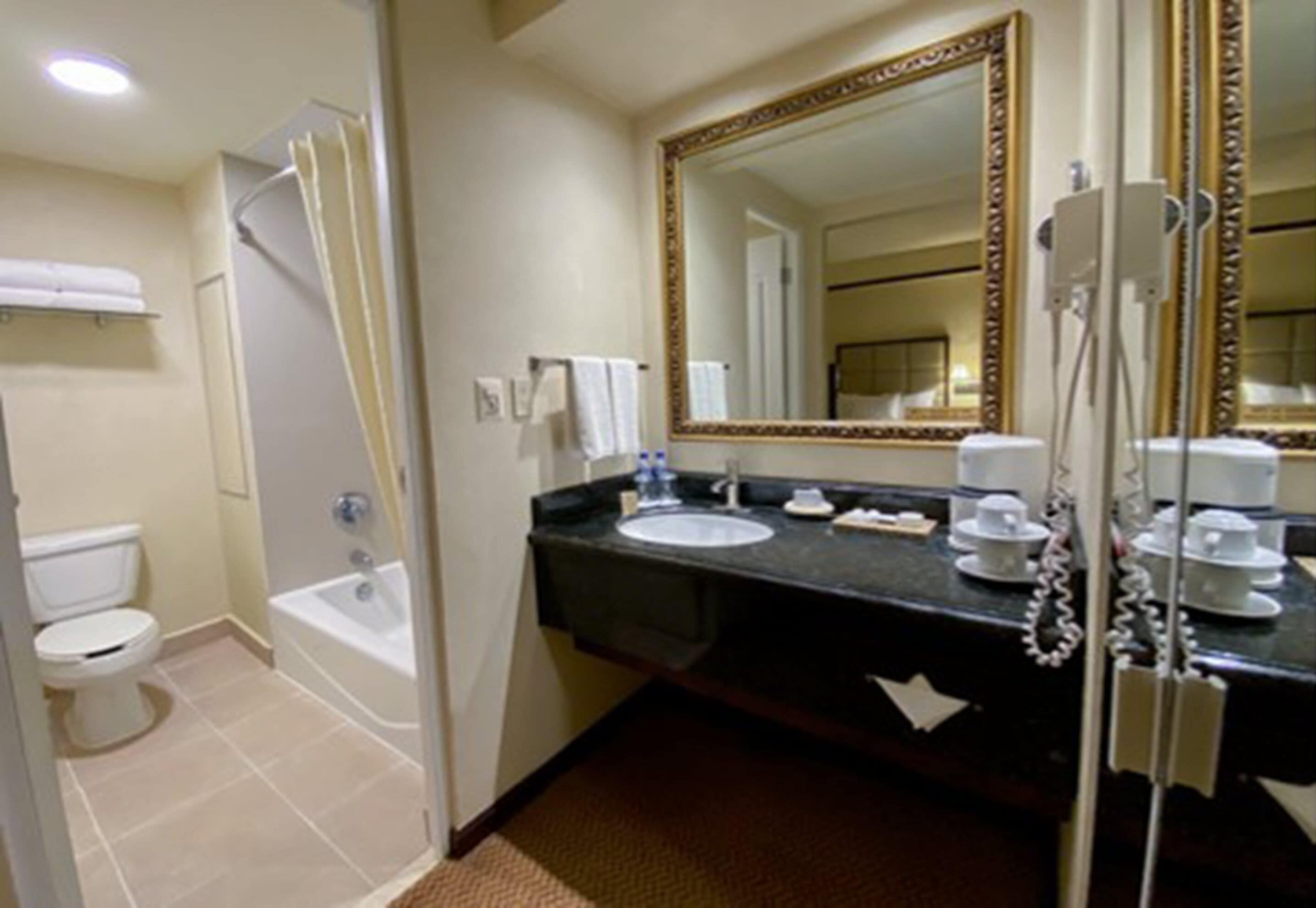 standard room, 2 double beds | bathroom | shower, hair dryer, towels