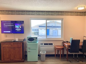 Premium bedding, memory-foam beds, desk, laptop workspace