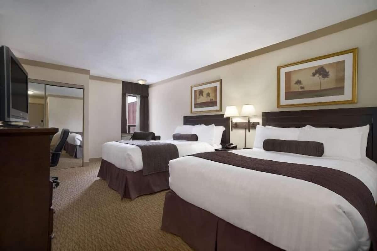 Premium bedding, pillowtop beds, desk, blackout drapes