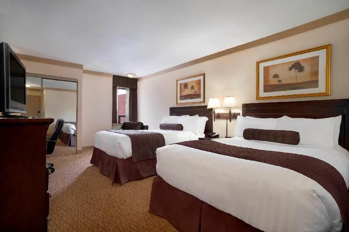 Premium bedding, pillowtop beds, desk, blackout drapes