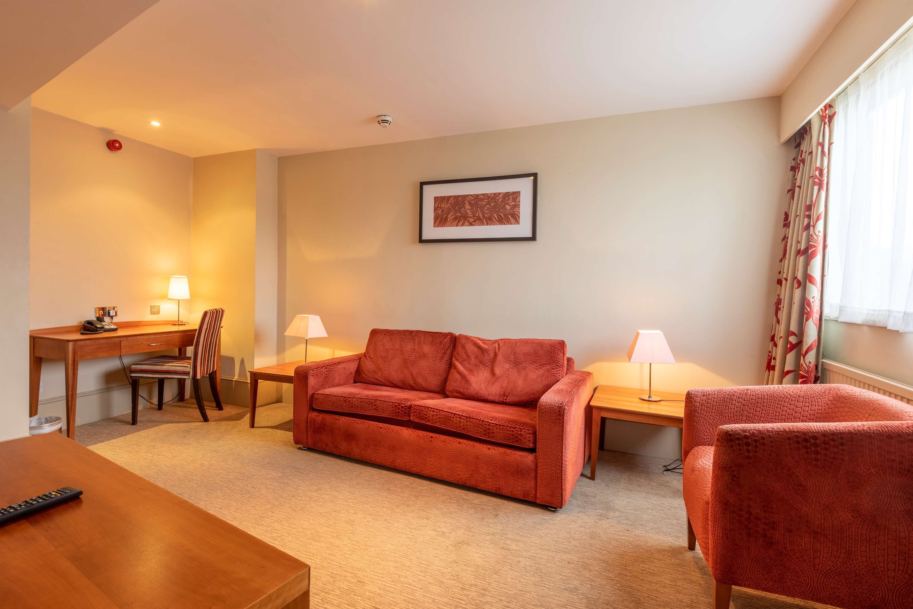 Superior Suite, 1 King Bed, Non Smoking (Separate Lounge) | Desk, iron/ironing board, free WiFi